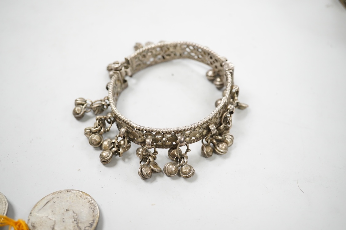 A collection of Bedouin white metal, gilt metal, lapis lazuli mounted jewellery, etc. from Oman
